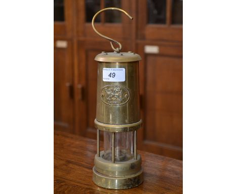 An Eccles miners lamp stamped to front with Cymru