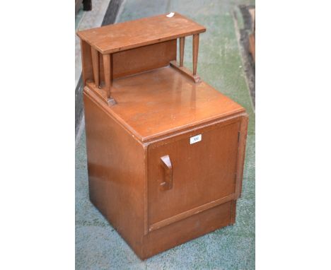 A G-Plan bedside cabinet, small shelf to the top, single door cupboard to base