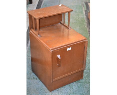 A G-Plan bedside cabinet, small shelf to the top, single door cupboard to base