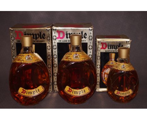 Two bottles of Dimple delux Scotch whisky together with a half bottle - All boxed