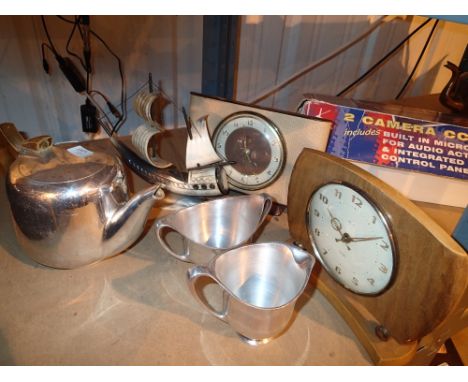 Picquot tea ware with a Smiths &amp; Benham mantel clock and horn carved ship 