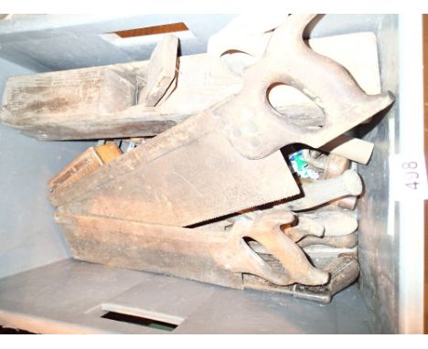 Box of vintage tools including Tenon saws and block planes 