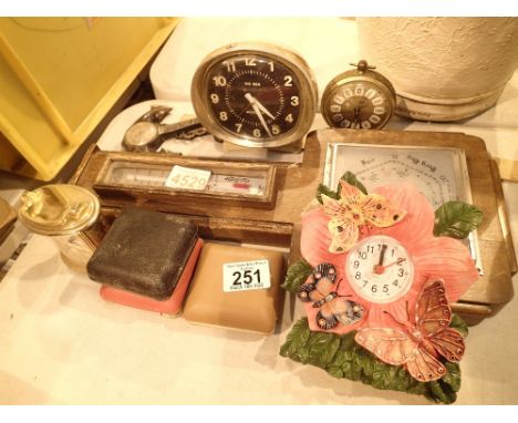 Collection of mixed clocks and a barometer 