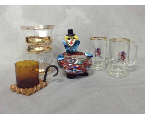 MURANO GLASS CLOWN ASHTRAYalong with set of six tankards decorated with highlander, a set of six shot glasses decorated with 