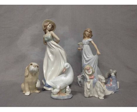 COLLECTION OF NAO AND SIMILAR STYLE FIGURES (12)