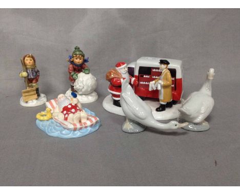 TWO COALPORT CHARACTERS 'FATHER CHRISTMAS' FIGURES, TWO GOEBEL FIGURES AND TWO NAO GEESE FIGURES