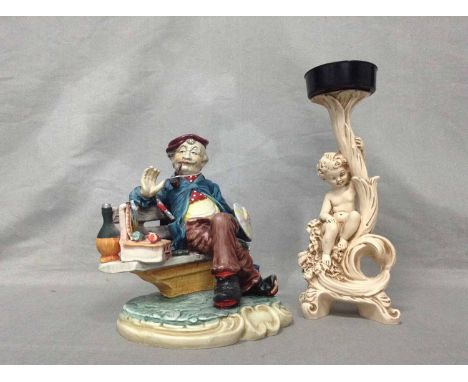 CAPODIMONTE STYLE FIGURE OF AN ARTISTalong with an Italian candlestick