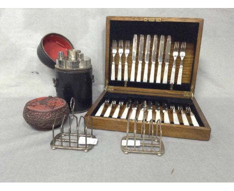 CINNEBAR LACQUER BOXalong with two silver toast racks, a whisky flask and a boxed set of silver plated cutlery