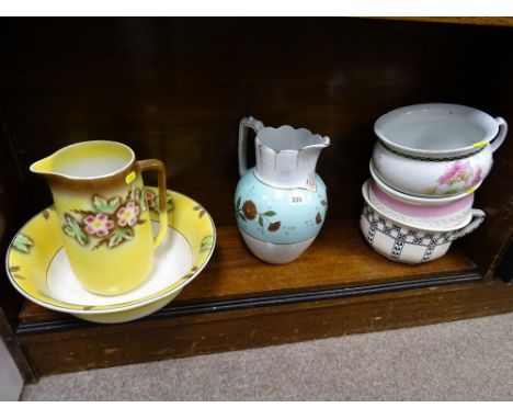 Pottery toilet jug and basin, a pottery toilet jug and three pottery chamber pots (bottom shelf)