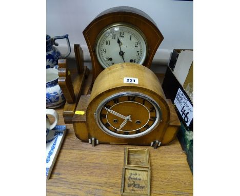 Edwardian mahogany and inlaid domed mantel clock with concave sides, eight day striking movement and another mantel clock etc
