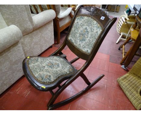 Vintage steamer type folding rocking chair