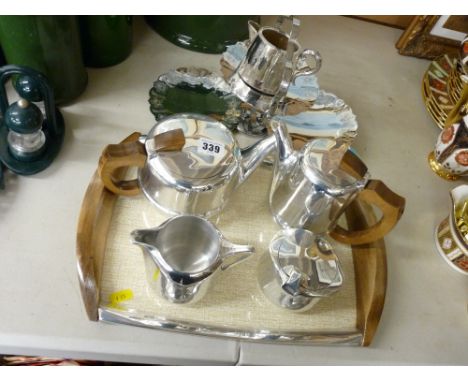 Excellent little used four piece Picquot ware tea and coffee service on a matching tray with a non-matching plated stand and 