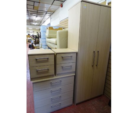 Modern light wood four piece bedroom set of two door wardrobe, four drawer chest and twin two drawer bedside chests