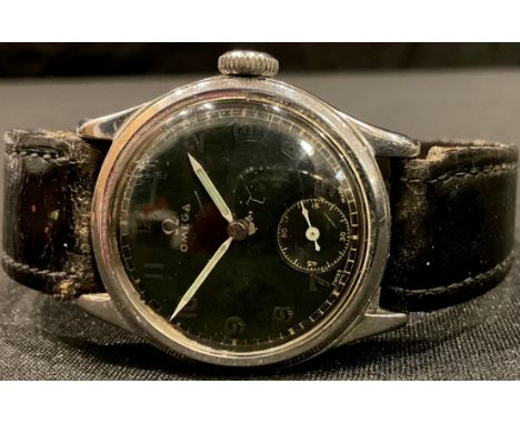 A vintage Omega black faced military wristwatch 