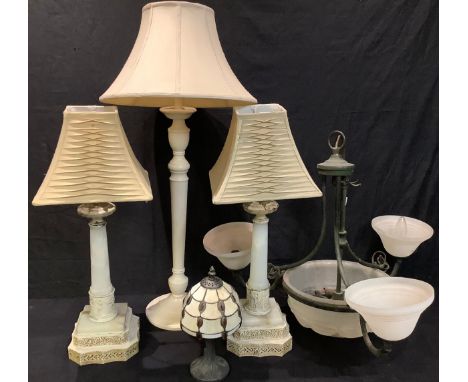 A ceiling light with central frosted domed shade and three similar branches; a pair of faux marble effect table lamps, with s