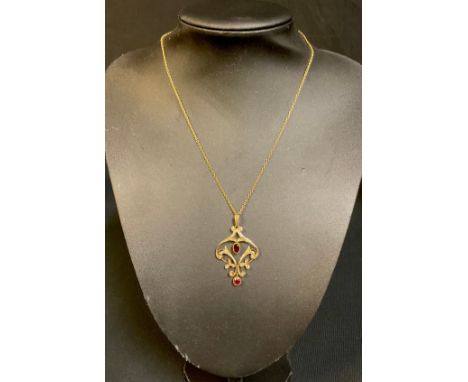 A late 19th/early 20th century 9ct gold seed pearl and garnet openwork pendant with droplet, 9ct gold later necklace chain, 5