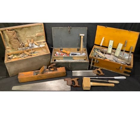 A late 19th / early 20th century stained pine carpenter's tool box, another similar, a later plywood metal mounted tool box; 