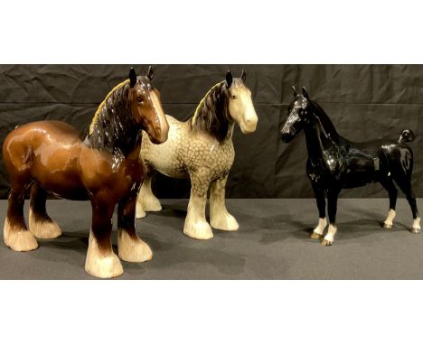 A Beswick model of a dappled grey Shire Horse; others, brown Shire Horse, a black Hackney Horse, all gloss glaze (3) 