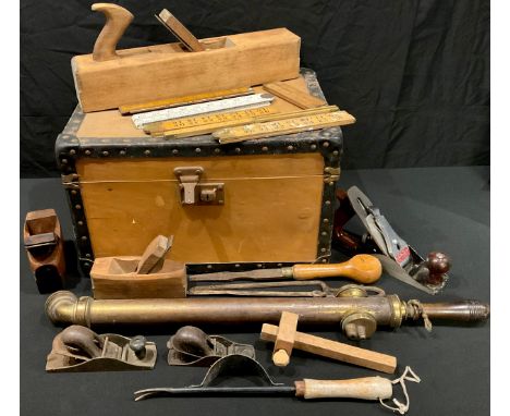 Tools - planes, measuring rulers, a rectangular box 
