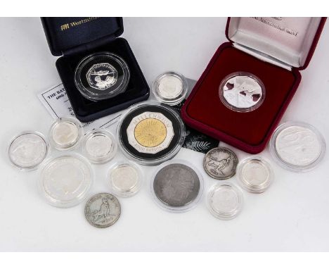 A collection of fifteen silver Commonwealth coins, including a 2000 Australia 50 Cents, a 2000 Gambia 2000 Bututs, and a Gibr