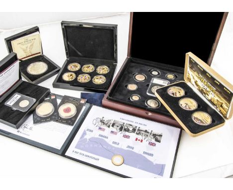 A collection of British and world commemorative coins and other medallions, including a 2015 Tristan Da Cunha Gold Plated Fir