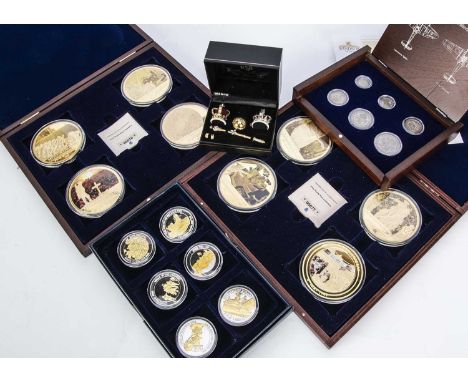 A collection of World War 1 and World War 2 Commemorative medallions and coins, including a Windsor Mint gold plated proof me