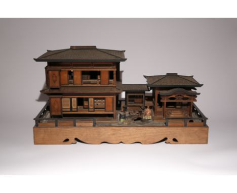 A RARE JAPANESE WOOD DOLL'S HOUSE MEIJI PERIOD OR LATER, 19TH OR 20TH CENTURY Constituted of three connected structures: the 