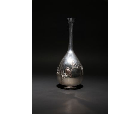 A TALL JAPANESE SILVER VASE BY HASEGAWA ISSEI MEIJI PERIOD, 19TH CENTURY The elegant quatrelobed body with an elongated taper