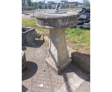An old weathered sundial. 73cm Height, 40cm diameter
