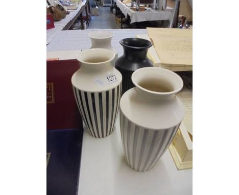 Four vintage striped Hornsea pottery vases, 28 cm tall.
