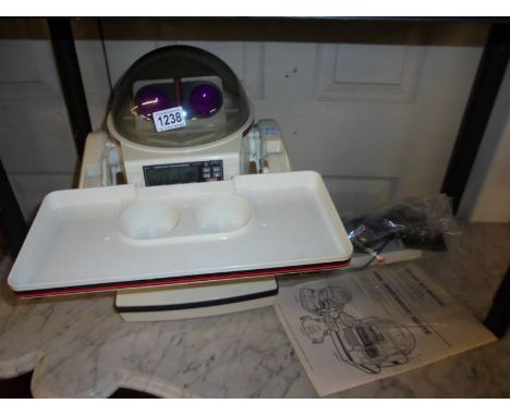 A Tomy S402 robot with accessories (not working).