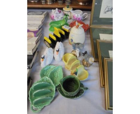 A mixed lot of kitchenalia ceramics including preserve pots, toast racks etc.,