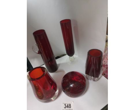 A quantity of red coloured art glass including Whitefriars 