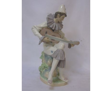Lladro figure of a clown playing guitar Approx.12" tall