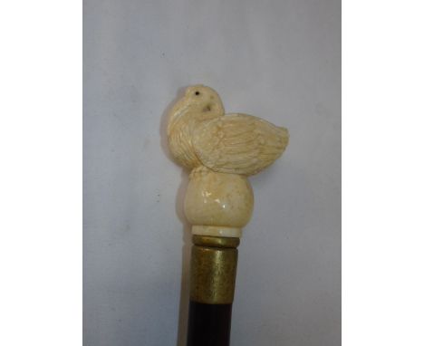 Walking stick with carved bone handle in the form of a bird