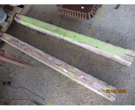 TWO HEAVY WOODEN GATE POSTS, EACH APPROX 12CMS SQUARE