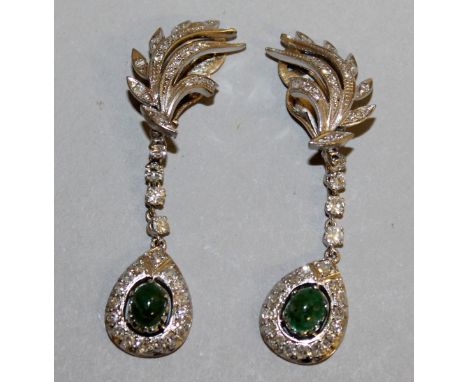 A LOVELY PAIR OF DIAMOND AND CABOCHON EMERALD DROP EARRINGS in 18ct white gold.