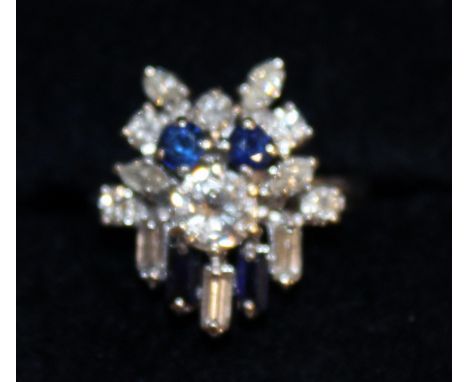 A LOVELY SAPPHIRE AND DIAMOND CLUSTER RING, set in 18ct white gold.