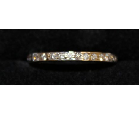 AN 18CT WHITE GOLD DIAMOND FULL ETERNITY RING.