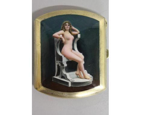 A SUPERB SILVER GILT .900 CIGARETTE CASE, the lid with an enamel of a seated nude in a chair.