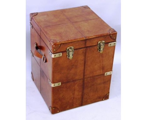 A SQUARE LEATHER TRUNK with brass mounts and leather carrying handles, rising top with fitted interior. 1ft 4ins x 1ft 4ins x