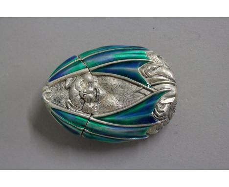 A SILVER AND ENAMEL "BAT" VESTA.