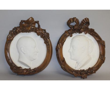 CHARLES HENRI JOSEPH CORDIER (1827-1905) A GOOD PAIR OF CARVED WHITE MARBLE CIRCULAR PORTRAIT PLAQUES, head and shoulders of 