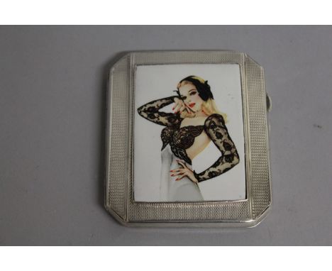 AN ENGINE TURNED CIGARETTE CASE, Birmingham 1942, the front with a semi nude.