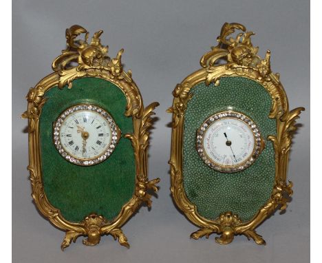 A VERY GOOD PAIR OF LINKE QUALITY ORMOLU AND SHAGREEN FRONT AND BACK EASEL CLOCK AND BAROMETER, the ormolu frame with scrolls