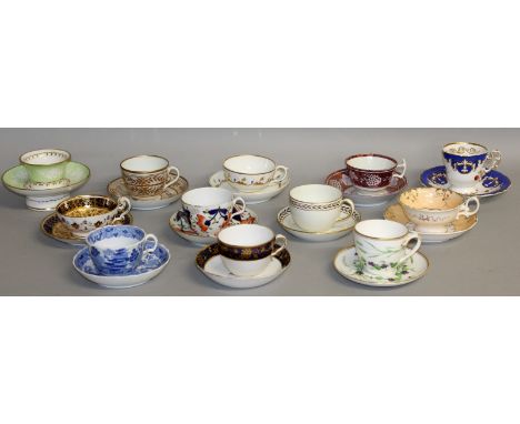 TWELVE 19TH CENTURY CUPS AND SAUCERS from New Hall, Coalport, Ridgway, Derby, and other factories.