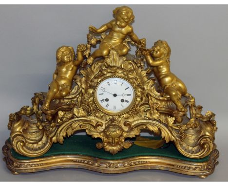 A VERY GOOD 19TH CENTURY FRENCH LOUIS XVI ORMOLU CLOCK with circular white enamel dial, black and white Roman numerals and ei