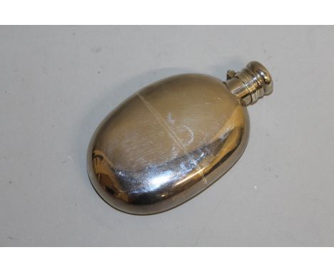 A PLAIN VICTORIAN SILVER HIP FLASK. London 1879.