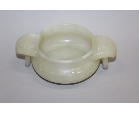 A GOOD QUALITY CHINESE JADE CENSER, with floral carved and loose ring handles, the stone of predominantly pale green tone, 6.