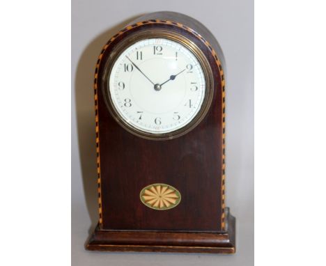 AN EDWARDIAN MAHOGANY INLAID MANTLE CLOCK with domed top and fan inlay. 8ins high.